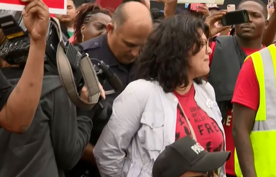 US House candidate arrested during wage protest in Detroit    