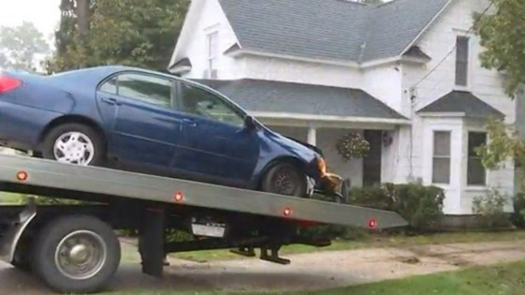 Car crashes into Allendale Township home    