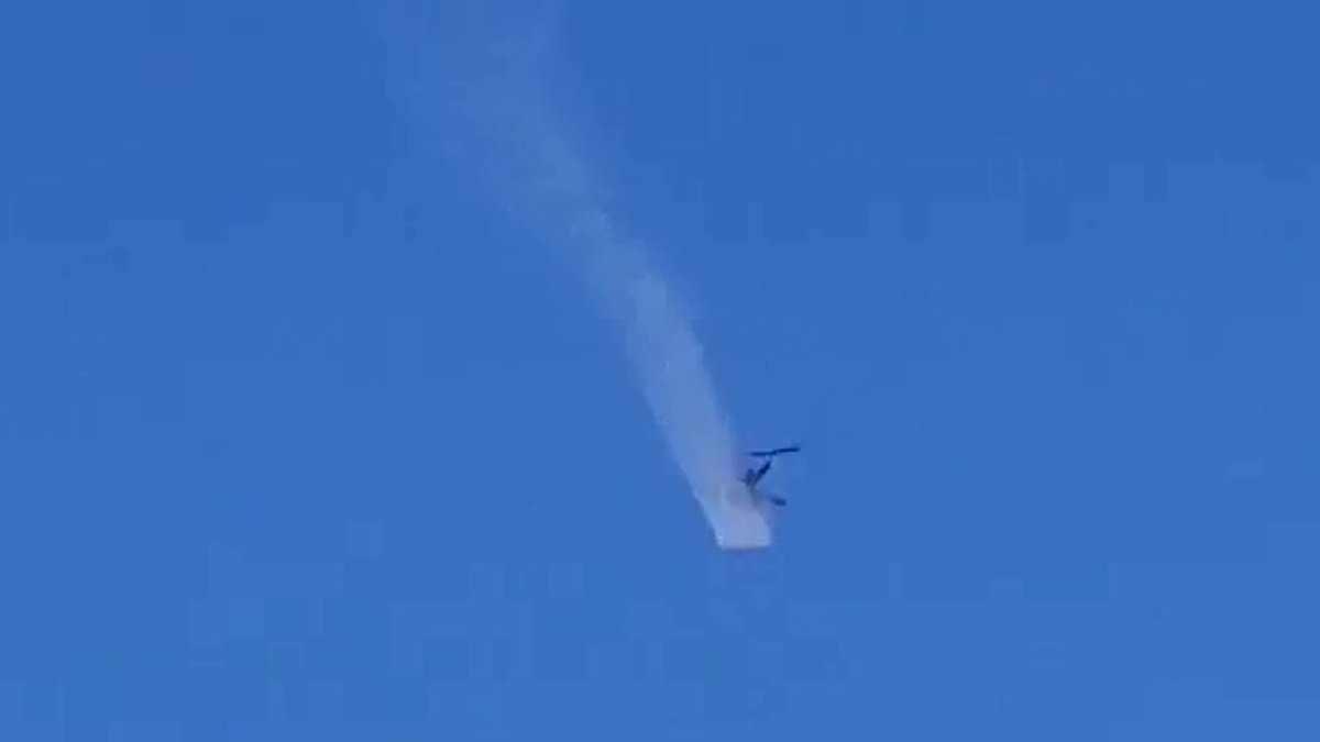 People near Sawyer Airport are asking about a military helicopter spraying a white mist over the former air force base in Michigan's Upper Peninsula.