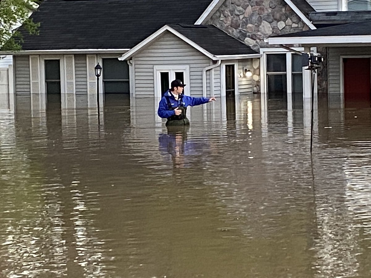 Devastating flooding near Midland.  Isabella Street. which is partially flooded itself. Homes behind are in at least three feet of water.