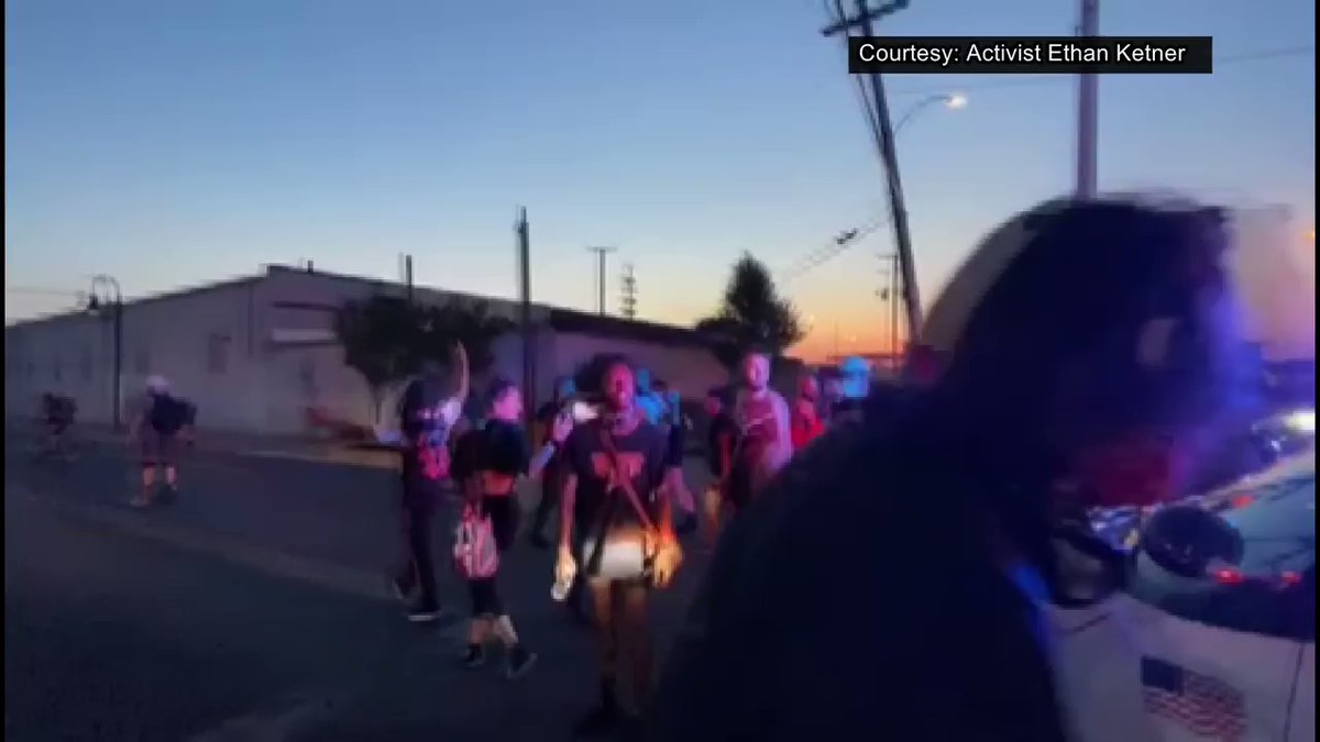Video may be disturbing for some viewers. This video, shot by a Michigan resident, shows a Detroit police officer driving through a crowd of BLM protesters Sunday night