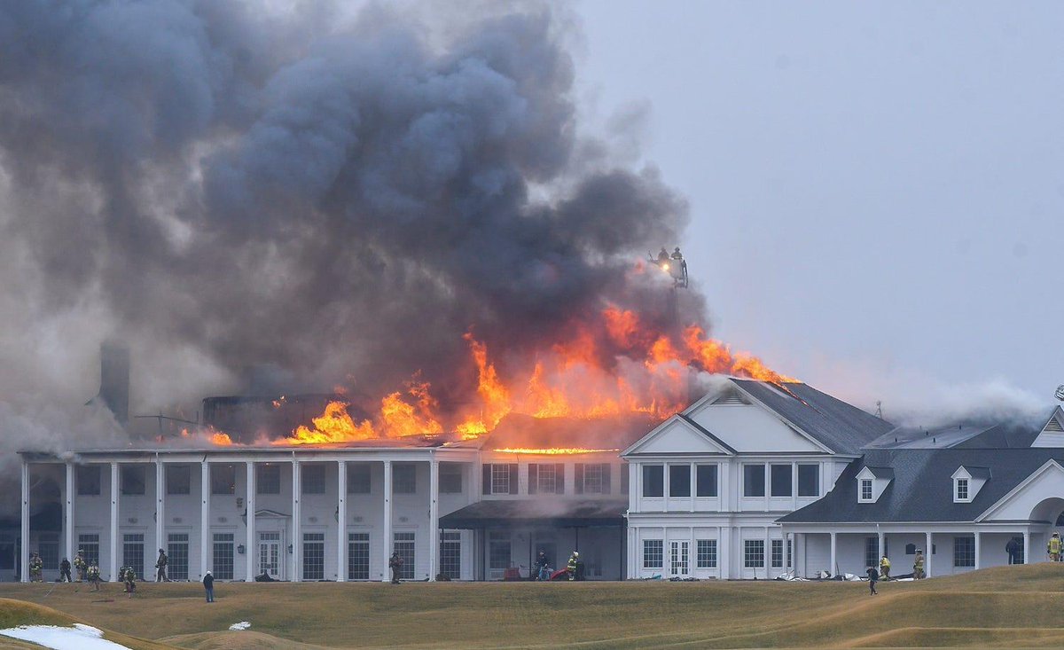 Firefighters are battling a blaze at Oakland Hills Country Club in Bloomfield Hills.