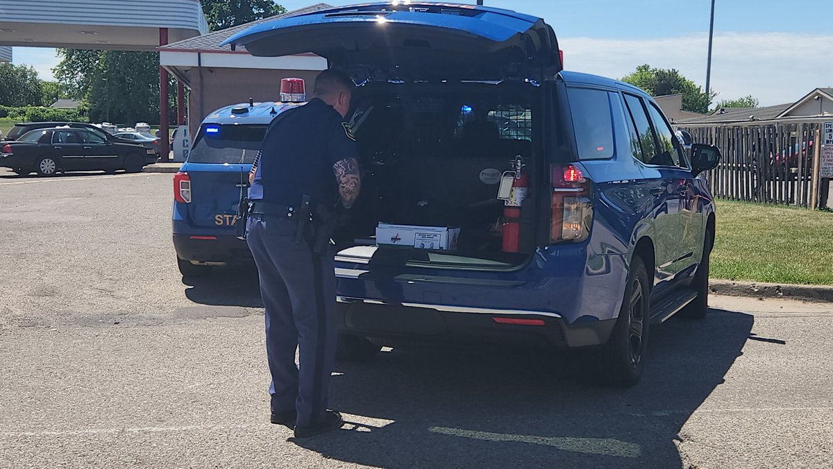 SWAT team and police negotiators are yelling on a megaphone for the man to come out with your hands up  surrender. Police said he was wanted for home invasion and was spotted at Motel 6- located next to the Wings Event Center