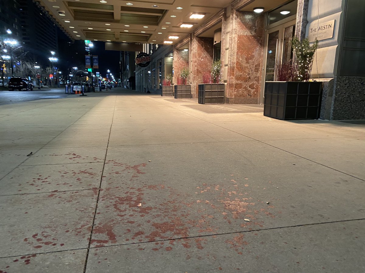 Shooting outside Westin Book-Cadillac Detroit downtown hotel; Four people hospitalized, at least two critical. SUV curbside on Washington Blvd at Michigan Ave about midnight is sprayed with bullets. Another SUV speeds away. 